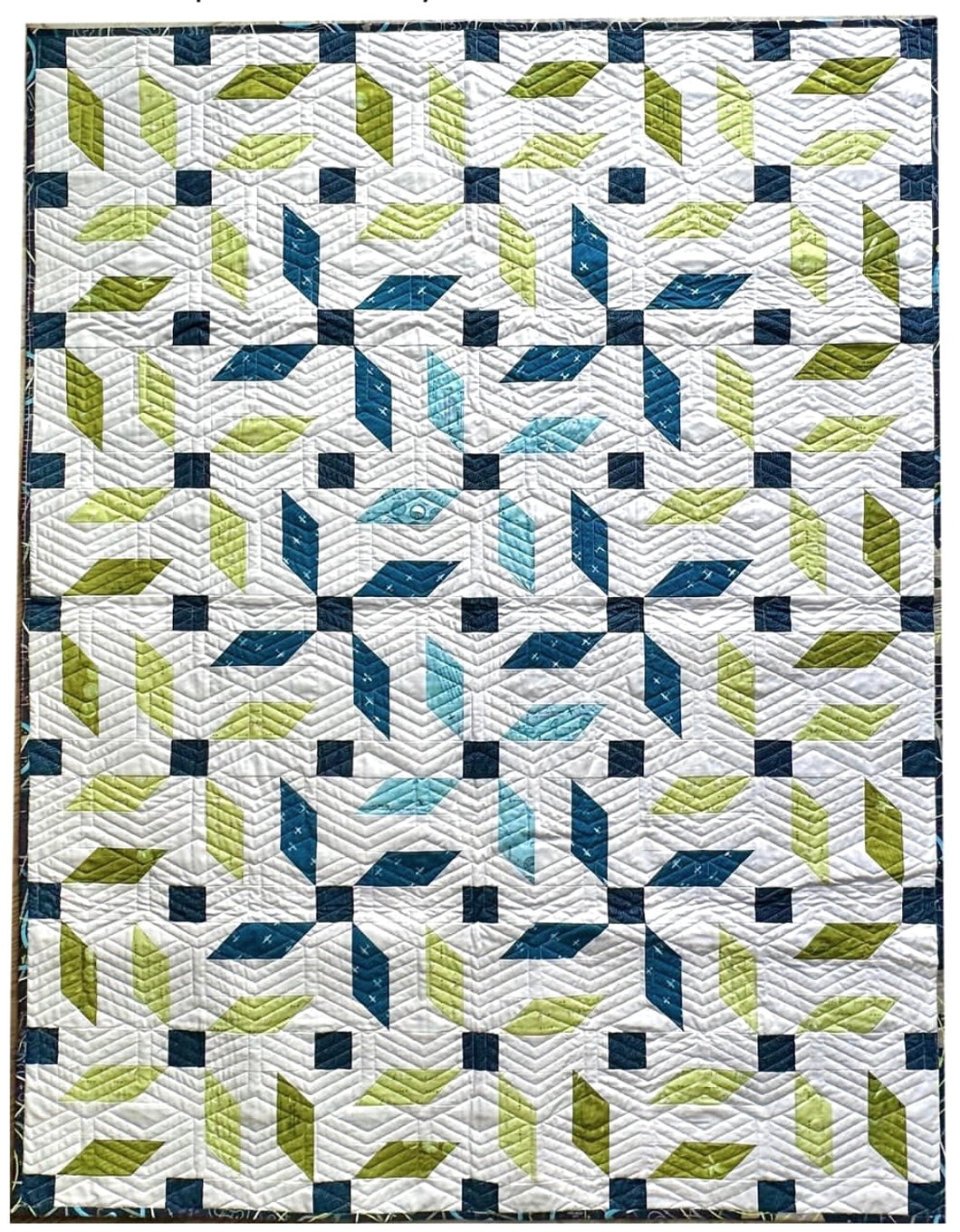 High Flight Propeller Throw Quilt Kit by Mandi Persell of Sewcial Stitch